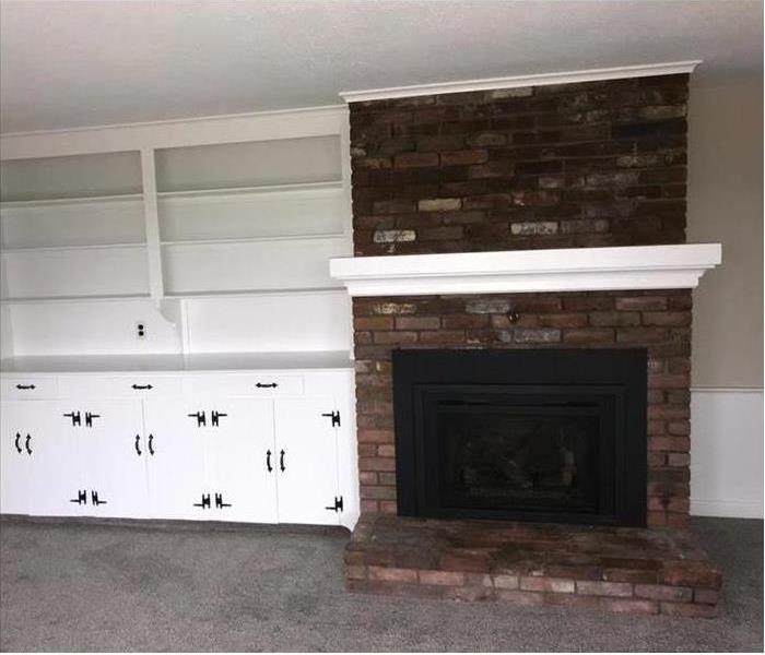 white cabinets restored along with the mantle