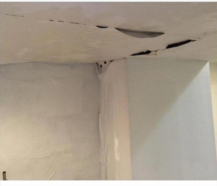 falling ceiling material and blistered paint on white surfaces