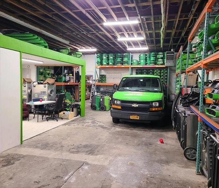 inside servpro warehouse, parked truck and supplies